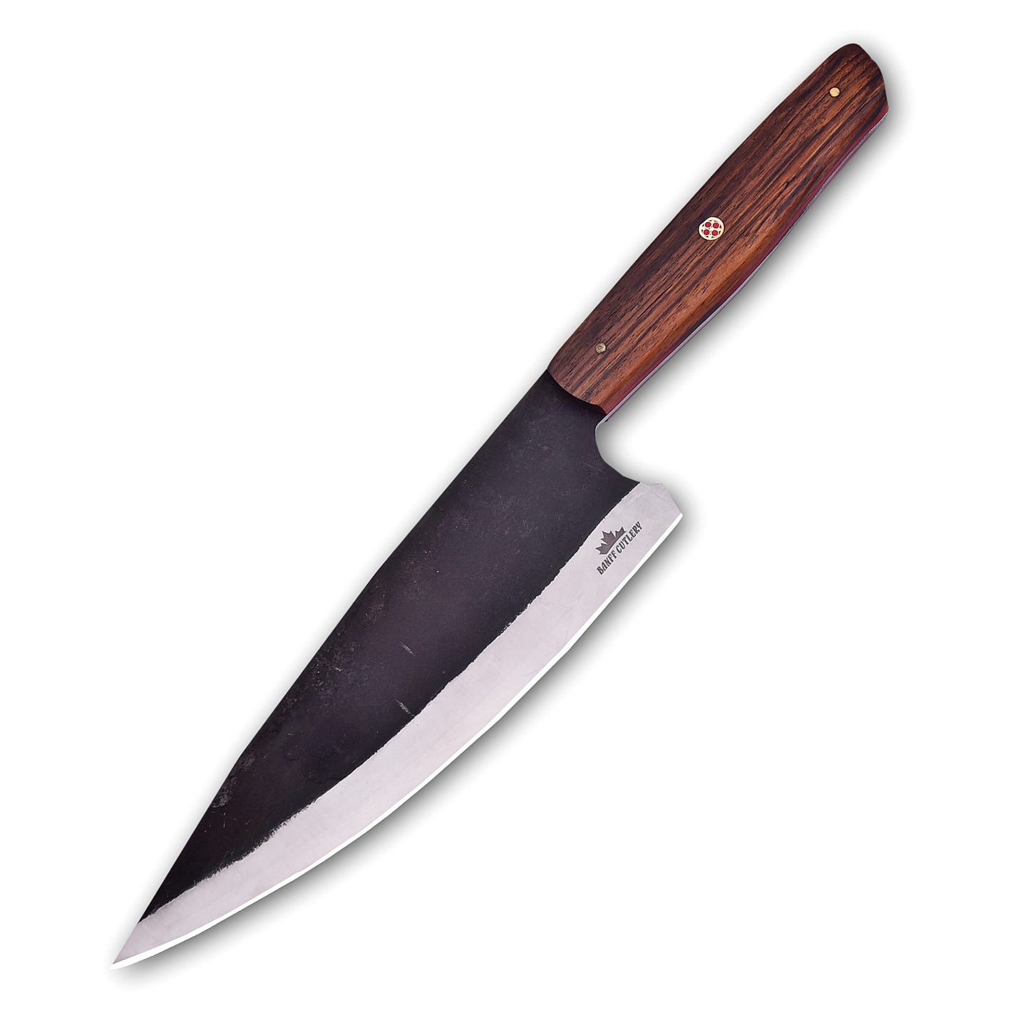 A chef's knife with a dark, forged carbon steel blade and a polished wooden handle featuring a brass rivet and mosaic pin, set against a white background.