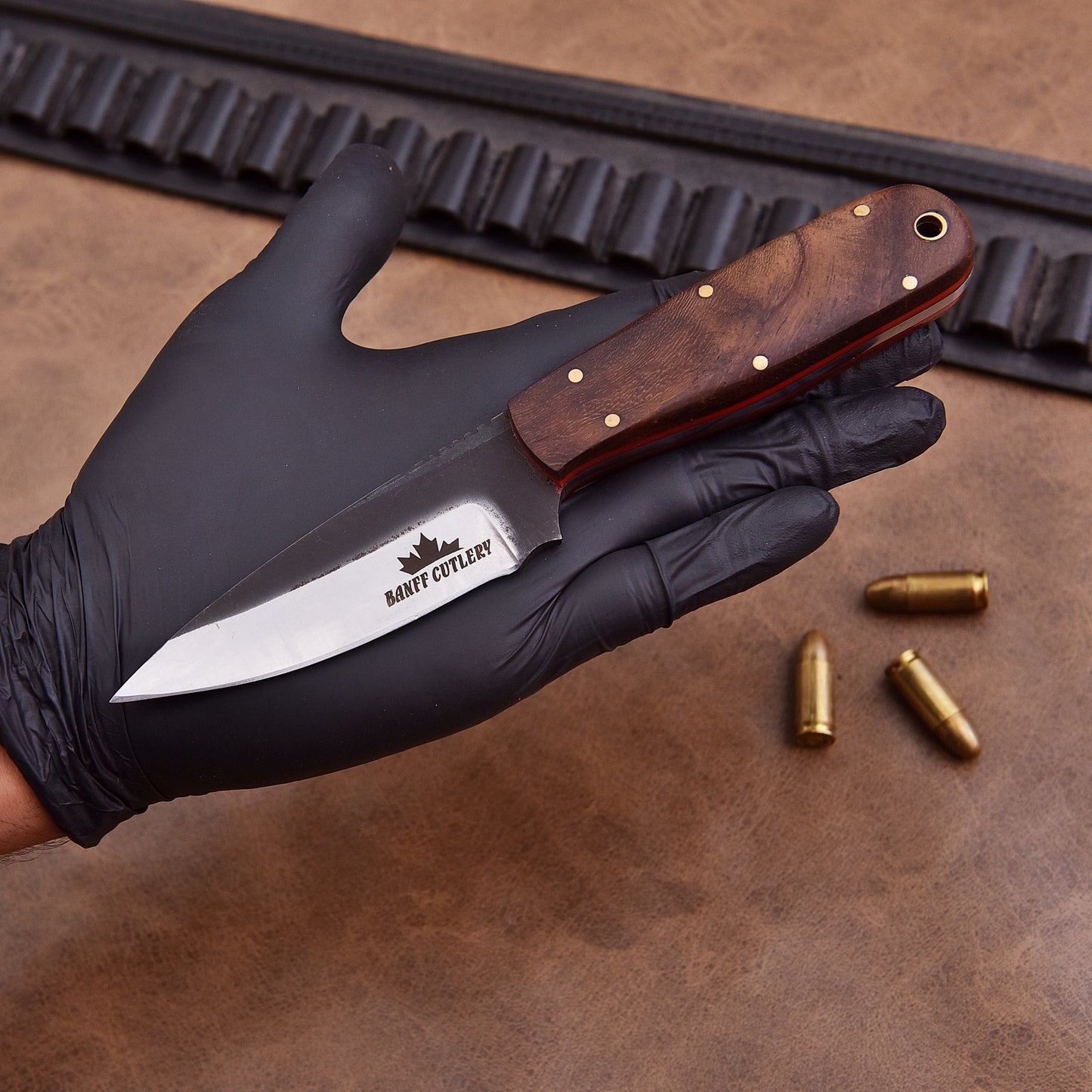 Versatile Pathfinder Knife for hunting, camping, and survival use in outdoor conditions.
