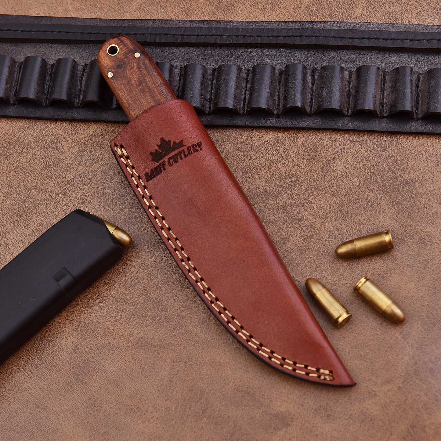 Durable leather sheath with Pathfinder Knife, perfect for outdoor enthusiasts.