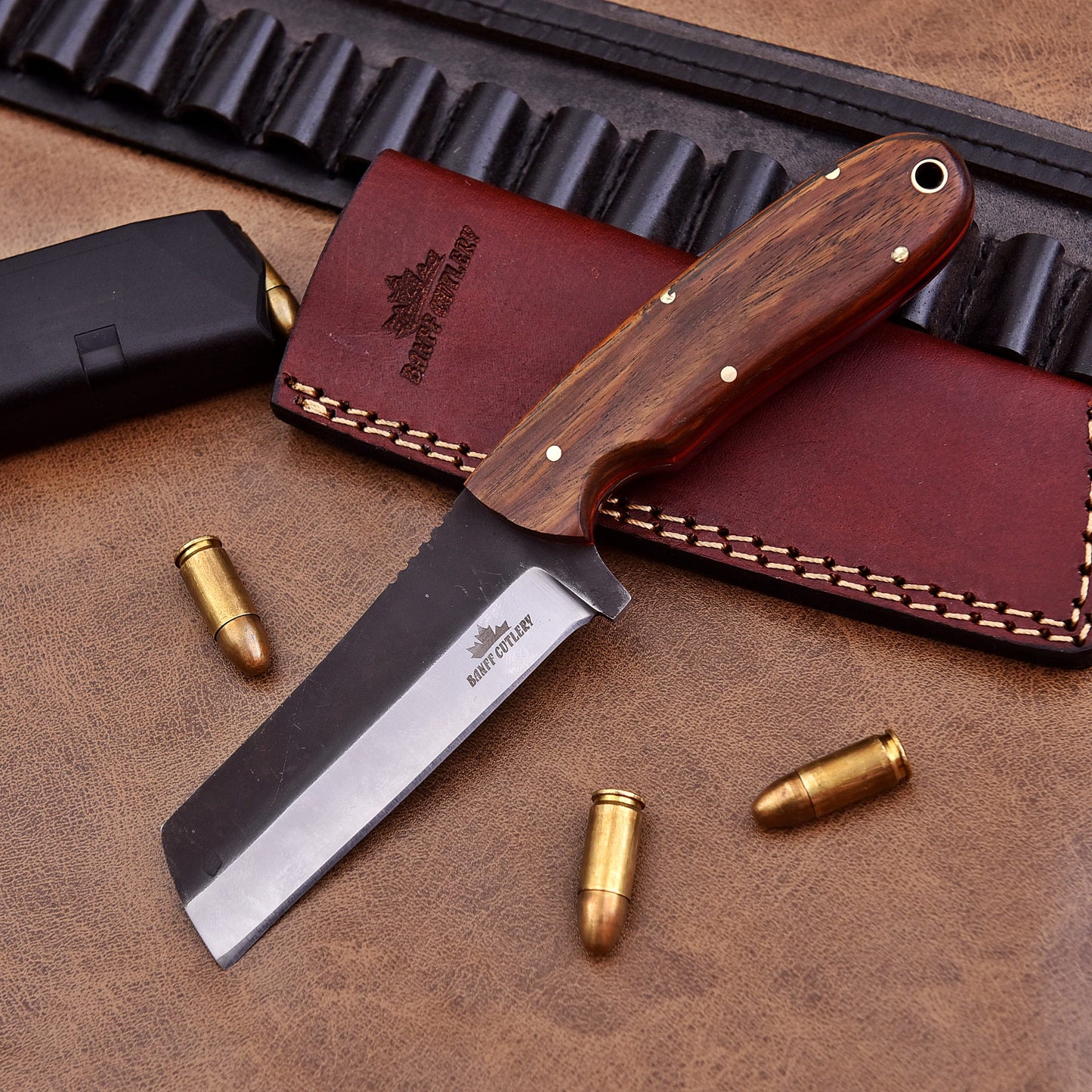 Multi-purpose Horn Breaker Knife with leather sheath and steel clip, offering convenience and reliability for outdoor and tactical use.