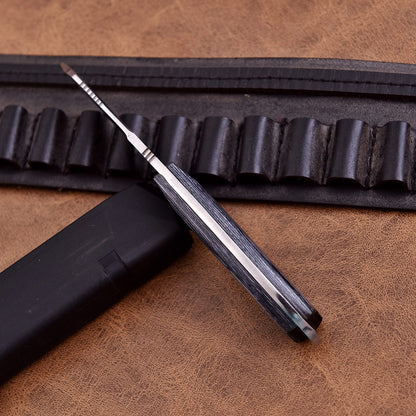 High quality handcrafted hunting knife with durable sheath and ergonomic grip.